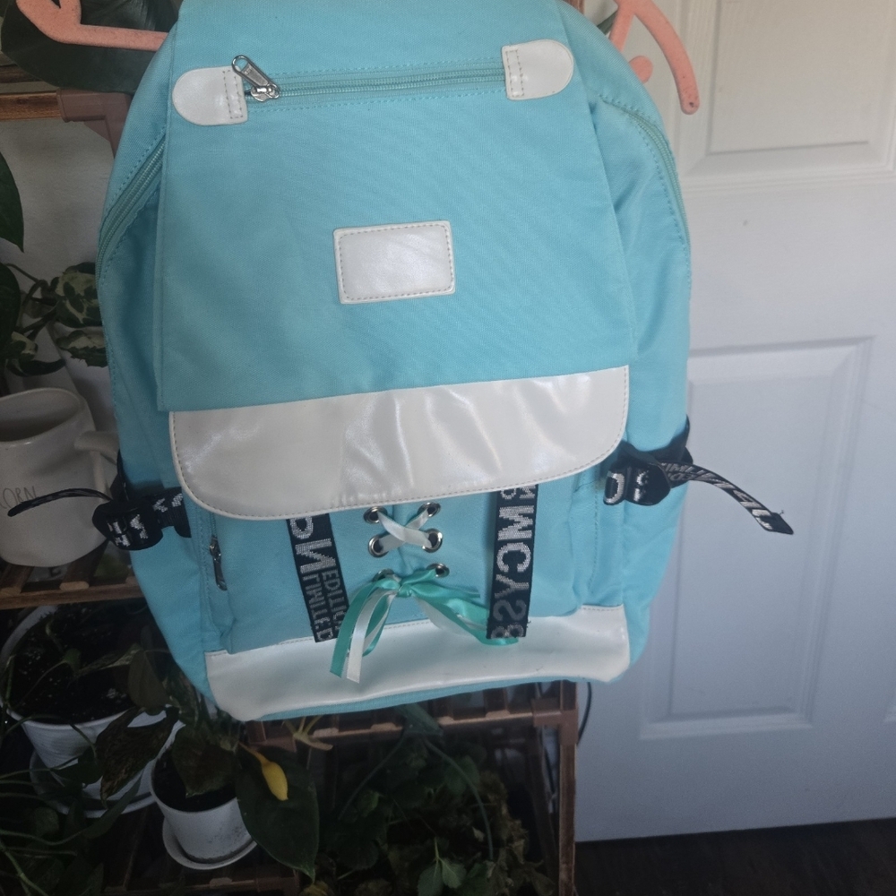 Light Blue Backpack with White Accents